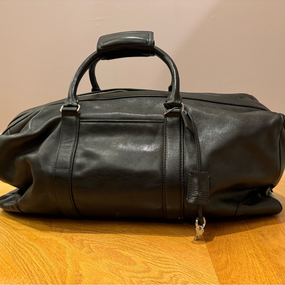 COACH leather weekender/ duffle bag with shoulder strap - NEVER BEEN USED